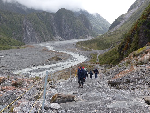 Looking down-valley from Fox Glacier towards Andrew on the trail, Nov 2015